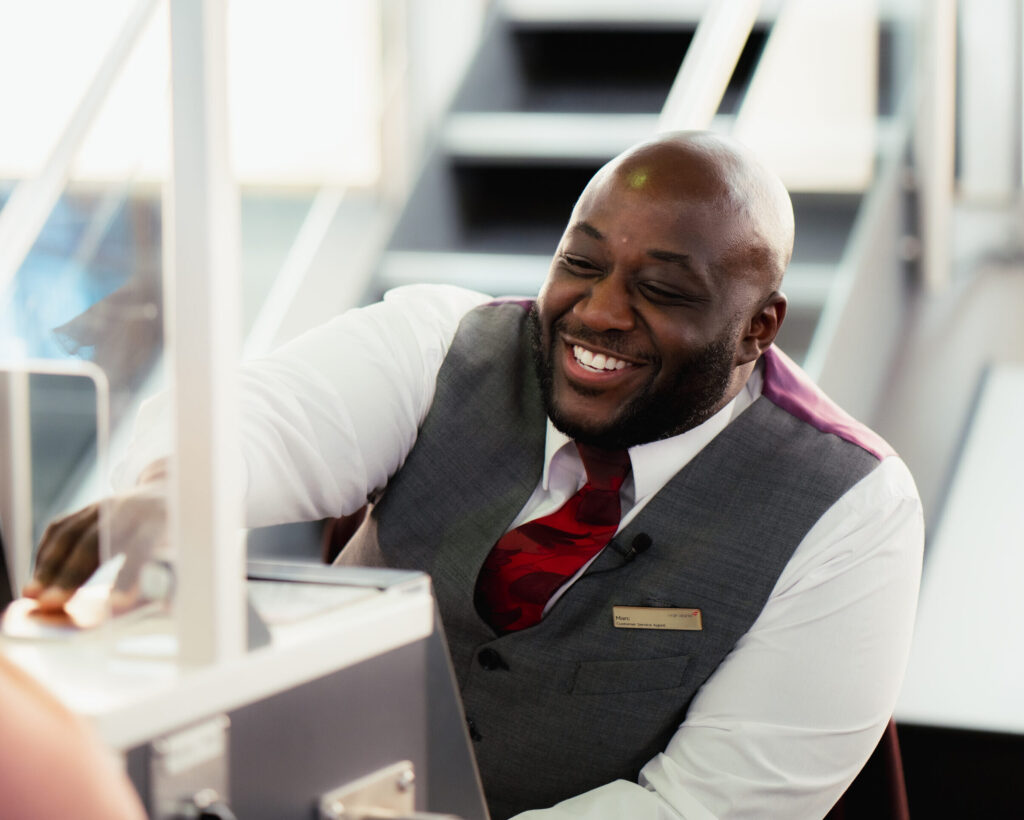 Virgin Atlantic employee at the desk