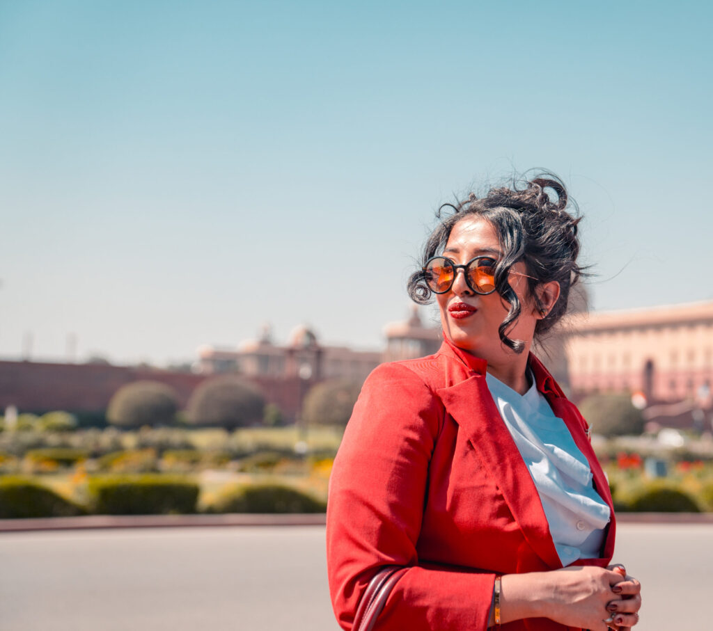 A Virgin Atlantic employee in uniform outside in India