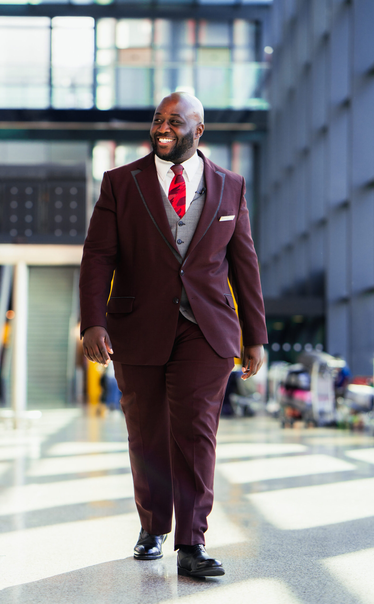 Virgin Atlantic airport team member walking through terminal